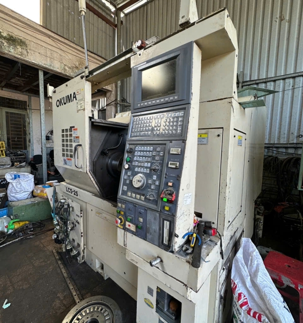 TIỆN OKUMA LCS25 OSP-U10 DATE 2003 