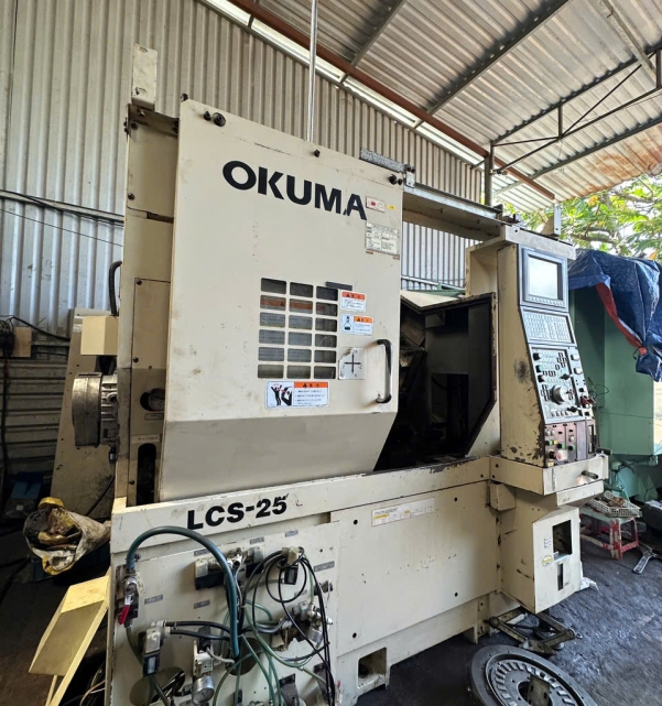 TIỆN OKUMA LCS25 OSP-U10 DATE 2003 