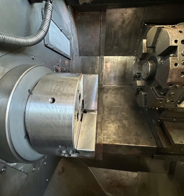 TIỆN OKUMA LCS25 OSP-U10 DATE 2003 