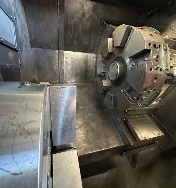 TIỆN OKUMA LCS25 OSP-U10 DATE 2003 